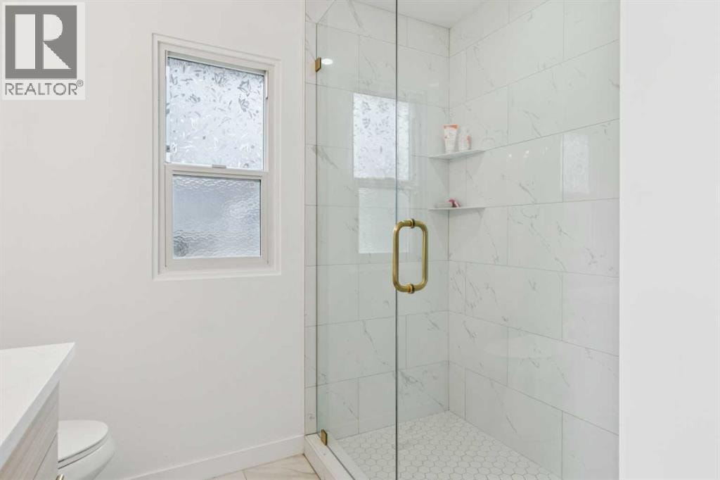 10719 Mapleglen Crescent SE — photo 28