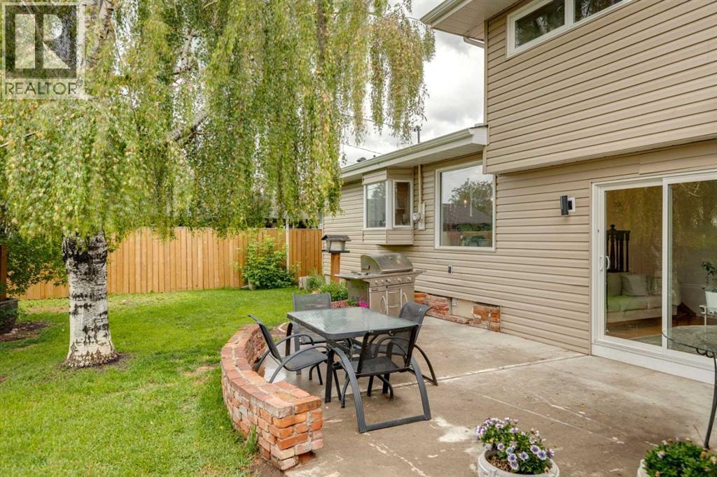 10719 Mapleglen Crescent SE — photo 42