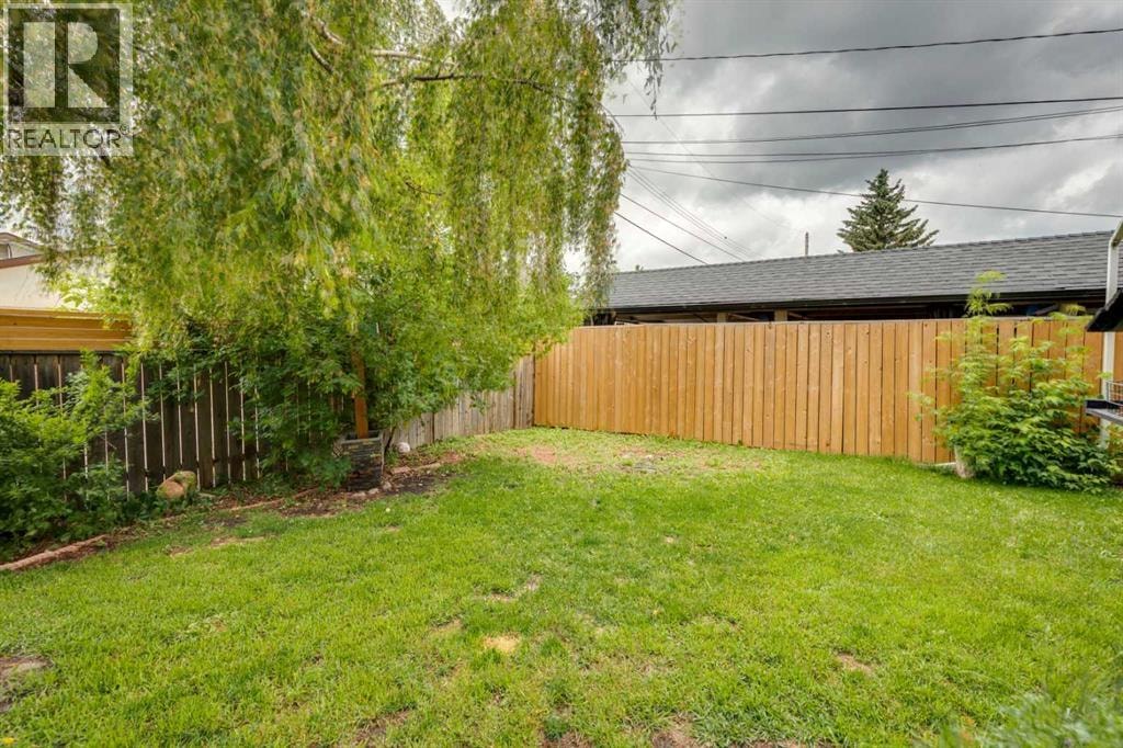 10719 Mapleglen Crescent SE — photo 47